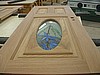 Brazilian Cherry oval lite door